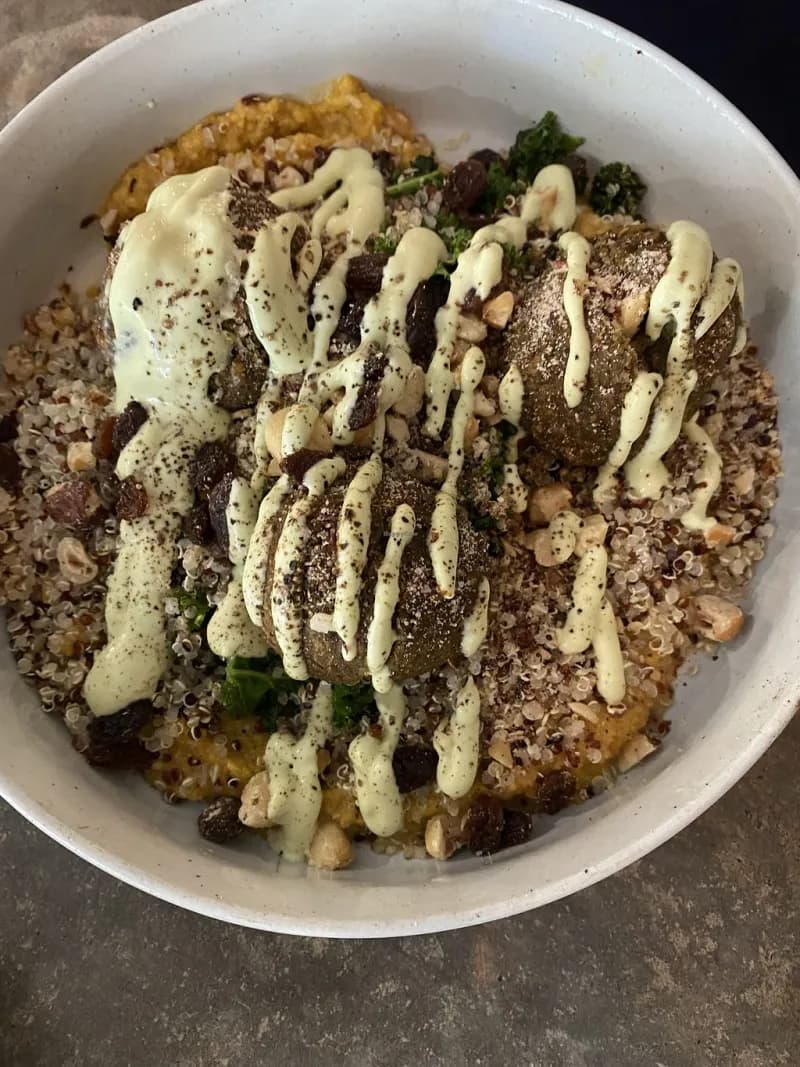 Falafel quinoa bowl with tahini drizzle